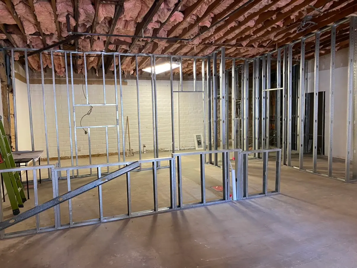 Steel stud framing laid out for the Good Source Coffee build-out in Escondido